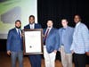 Yair Rodriguez presents Proclamation to Dr. Lenell Navarre as Nick Medina, Kraig Kistinger and Henry Drake join him.