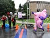 The unicorn crosses the finish line at the finish line during the 19h annual Cougar 5K Run/Walk 