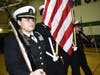 Alondra Gonzalez from Chicago Heights, a member of Bloom High School Jr. Navy ROTC helps the Posting of Colors. 
