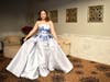 Rebekah Crane, a student at Marian Catholic high school, models a prom dress by Kimberly Bond Boutique at Georgios Banquets in Orland Park. Prom dresses and mother of the bride dresses are available at the boutique