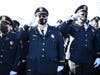 Chicago Heights police officers stand at attention during the funeral of Gary Hibbs, a Chicago Heights police officer. 