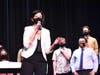 Allison Powell, new Marian Catholic choir director welcomes the audience to the first in person choral concert of the school year. "Arts are essential" said Powell. "Music is the universal language we all speak."