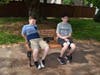 Andrew and Peyton Crotty sit on a bench in memory of their grandmother, Maggie Crotty. 