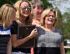Kathryn Straniero, Bremen Township Supervisor, listens to stories about Maggie Crotty during a dedication held in Oak Forest behind the youth/Senior center. 