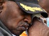 Rufus Meeks, a world war 2 veteran from South Chicago Heights, wipes away tears as Terry Matthews, Village President of South Chicago Heights reads the poem “Remember Me” written by Jocko willink. 
