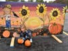 Olivia Denlinger picks out her pumpkins at Trinity Lutheran Church's Pumpkin Patch. The patch is open Friday and Saturday from 11:30-6:30PM in the church parking lot located on 159th Street in Tinley Park. 