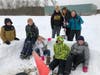 Students take a break during igloo construction at Great Bay Charter School