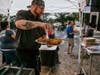 Chef Matt Provencher finishes Vernon Fried Chicken with a dusting of salt.