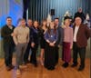 Past scholarship recipients with trustees of the Exeter Area Scholarship Fund, and organizers of the fundraiser. 
