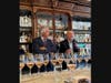 Tony Callendrello speaks in the Exeter Apothecary during the Vino e Vivo wine club event as Gérard Bertrand listens.