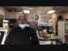 Kevin Gillespie, owner of Ma Dears Southern Cuisine, participates in the Neighbors Helping Neighbors Dinner Project preparing meals for residents.