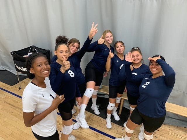 Cece, at far left, with a white jersey