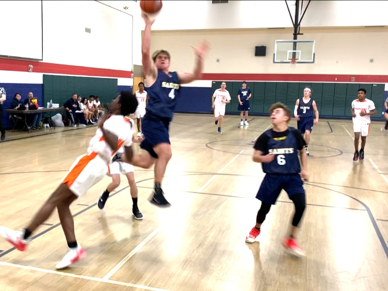 Marcus Scribner, on a layup, tries to provide the spark to come from behind against SCVi.