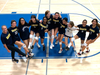 Frida Macias (far right) celebrates another Lighthouse Christian Academy volleyball victory.