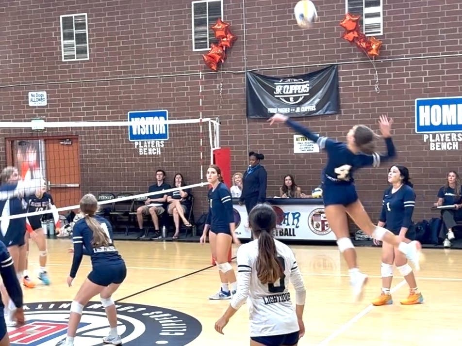 Jillian Jenkins fires off a backrow hit