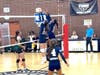 Emma Mefford (left block) and Kallie McKinney slam the lid down on the pot to deny Glendale Adventist Academy any advantage.