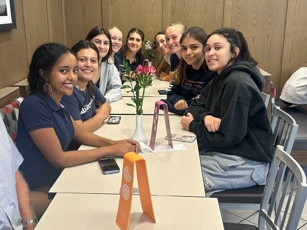Bethania Wonagseged (left) enjoys dinner after the game in Thousand Oaks