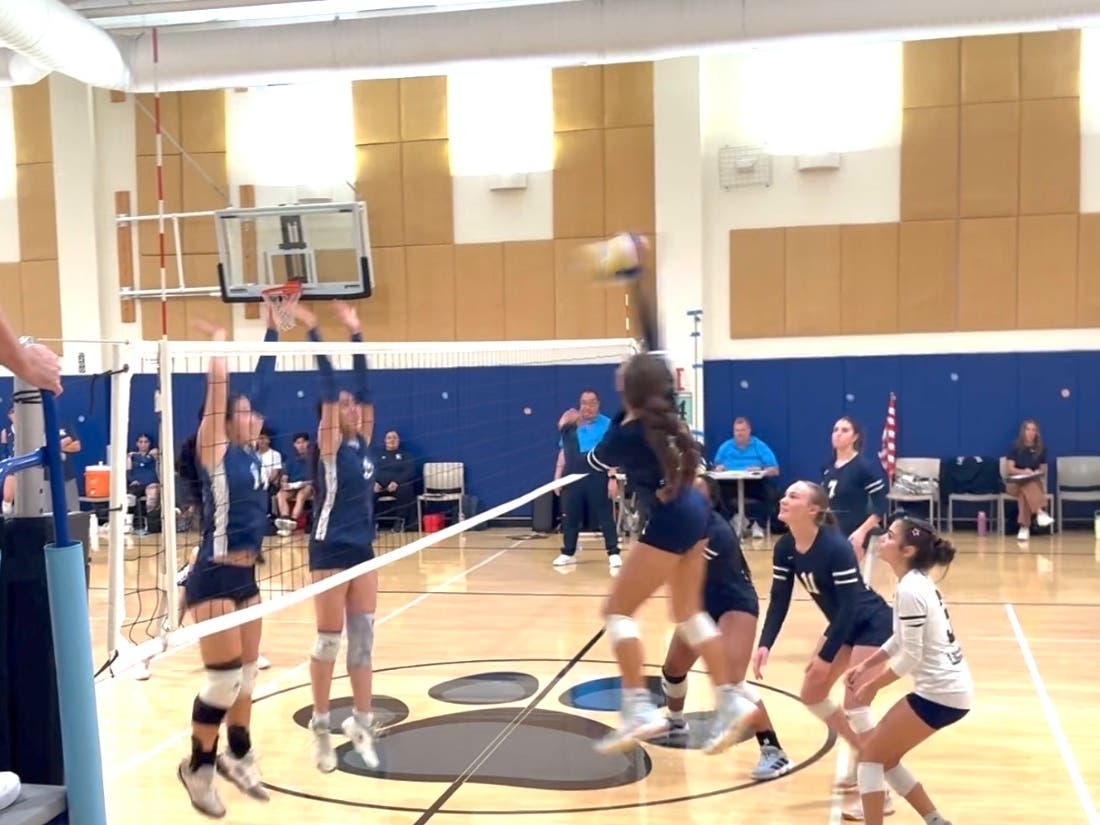 Block buster Jillian Jenkins scores the last point