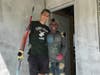 MHS Junior Tim Bennitt painting a house