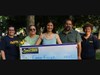 Emma Fisler and her family with Jaycees members Amy Labreche and Lisa Jolicoeur 