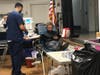 First Time Donor Dmytro Yaskal catches up on a show while making his donation.