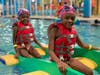 Families enjoy family swim at the Goldfish Swim School and Make-A-Wish Fundraising Event. 
