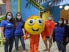 Bubbles and friends welcome guests at the Goldfish Swim School and Make-A-Wish Fundraising Event. 