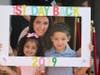 A parent with her two children at SHA’s opening day of school