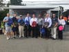 Members from the Nassau County PBA with Board President Dr. Frank Chiachiere, Wheeler Avenue Principal, John Frias and Assistant Superintendent for Curriculum and Instruction, Judy LaRocca, holding some of the new backpacks that students received. 
