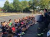 Plainview Fire Department members displaying vital fire safety tips in an effort to educate the students about fire safety and the experiences of volunteer firefighters.