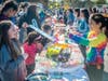 Students of Valley Stream UFSD Thirteen’s Willow Road Elementary School participating in goodie bag making, wooden figurine painting, and hairstyling at the annual Fall Festival. 