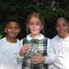 East Woods students with some Japanese Yew berries they collected during their walk, they make for a great face paint too!