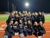 Plainview-Old Bethpage John F. Kennedy High School Kickline team at the annual Coaches vs. Cancer football game showing their support for breast cancer awareness and Stacy’s Warriors.