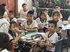 The class at the Ce Corajon De Maria School in San Salvador, El Salvador listening intently to the lesson being taught to them.