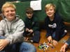Third and sixth grade students working together to build holiday decorations out of LEGOs as part of the LEGO Build to Give initiative. 