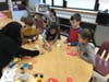 Mrs. DiScala's Kindergarten class and Technology Coach Cindia Alvarado utilizing James A. Dever Elementary School’s new Innovation Lab.
