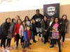 Former Harlem Globetrotter and youth motivational speaker, Corey the Dribbler posing with a group of Silverstein Hebrew Academy students at his presentation. 