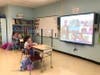 Students in Ms. Mazza‘s  and Ms. Villella’s 3rd  classes listening to students from NYIT College of Osteopathic Medicine and St. John’s University Physician Assistant Program read aloud to them.