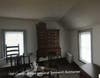 Students viewing the 18th century bedchamber of Samuel and Sarah Townsend, preserved to be historically accurate. 