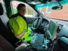 A Glen Cove police officer takes the students on a virtual tour of a police car and discusses the importance of the Glen Cove police and fire departments.