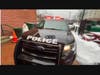 A Glen Cove police officer takes the students on a virtual tour of a police car and discusses the importance of the Glen Cove police and fire departments.