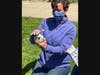 Julie Nelsen, education manager at the Theodore Roosevelt Bird Sanctuary, speaks with students about the different physical characteristics of various birds. 