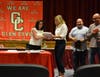 Dr. Maria Rianna, Superintendent of the Glen Cove City School District awarding a Melanie Arfman, representing the administrators for the Glen Cove City School District for their commitment to students and staff during the COVID-19 pandemic