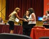 Dr. Maria Rianna, Superintendent of the Glen Cove City School District, presenting Gail Nedbor-Gross with a plaque for her 13 years of service on the Glen Cove Board of Education.