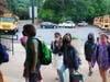 Students at Laddie A. Decker Sound Beach School arriving at school on their first day.