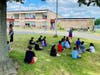 Gribbin Elementary students enjoying an outdoor lesson in the nice weather.