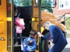 Adhering to District protocols, students arrive at school and have their temperatures taken prior to entering their school building.