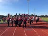 The Glen Cove High School marching band makes their way around the football field before the big game.