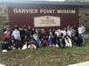 Landing students pose in front of Garvies Point Museum and Preserve during their field trip. 