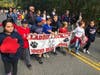 Students from Miller Place School District’s Laddie A. Decker Sound Beach School march in the homecoming parade with their fellow classmates.